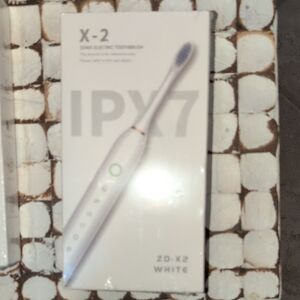 White Sonic Electric Toothbrush